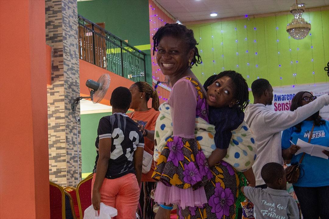 Parent and child engaging in developmental play at home